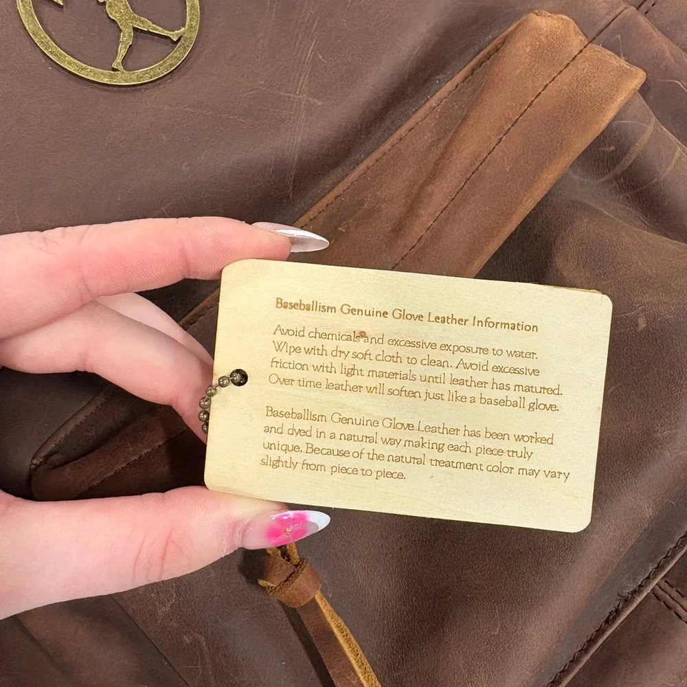 Vintage Brown Leather Backpack - Branded Logo